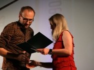 Marcin Koszałka receiving People's Choice Award